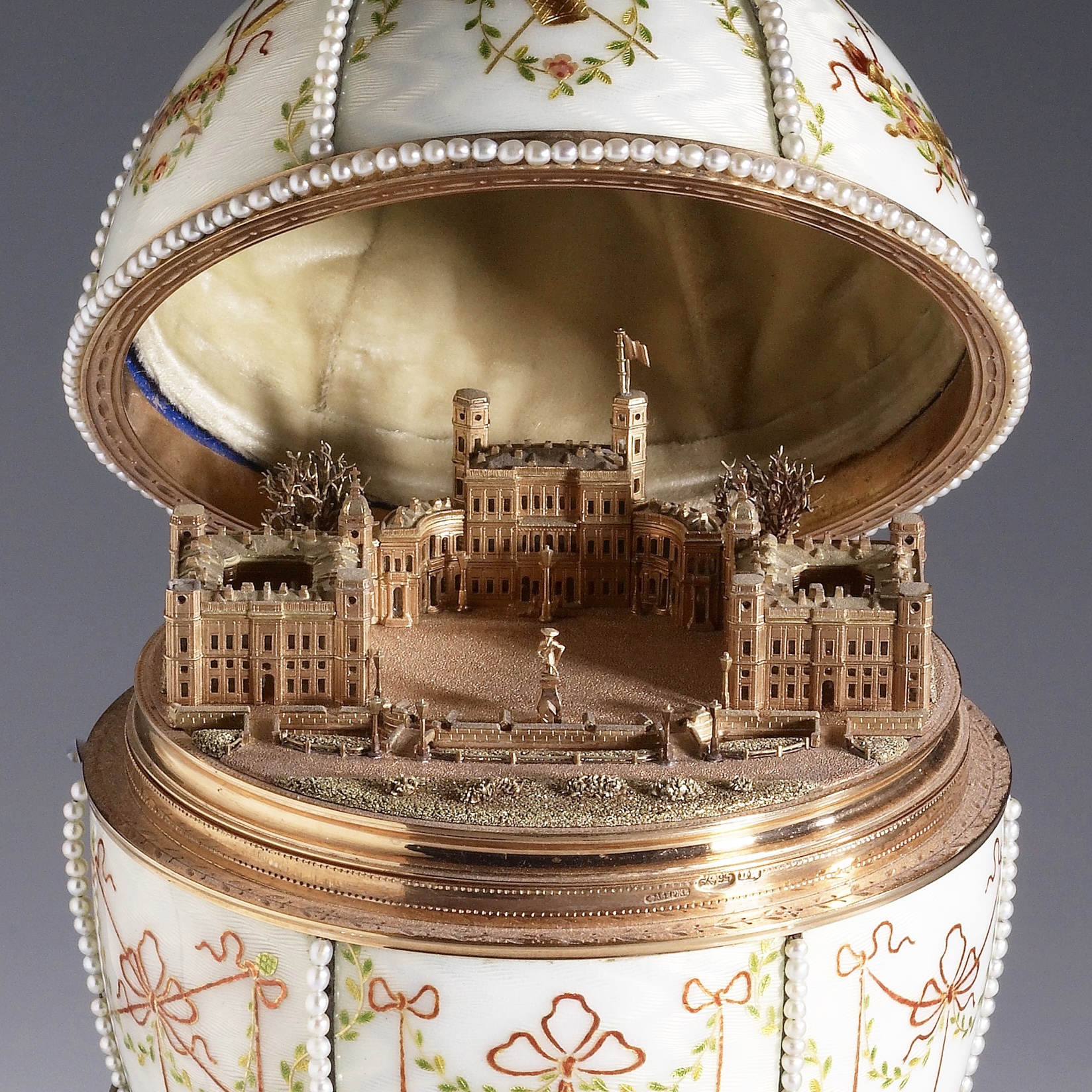 Fabergé And The Russian Crafts Tradition:
An Empire’s Legacy

Gatchina Palace Egg
House of Fabergé (Russian, est. 1842) (Manufacturer)
Mikhail Perkhin (Russian, 1860-1903) (Workmaster)
Peter Carl Fabergé (1846-1920) (Other)
1901
gold, "en plein" enamel, silver-gilding, portrait diamonds, rock crystal, and seed pearls
(18th and 19th Centuries )

As far back as antiquity, decorated eggs have been given to celebrate the blossoming of nature in the springtime. The tradition was taken up by the Church to celebrate the resurrection of Jesus Christ at Easter.

In 1885, to celebrate the 20th anniversary of their engagement, Tsar Alexander III had the idea of giving an Easter egg to his wife Marie Fedorovna. This was the first in a long tradition, perpetuated by his son Nicholas II, who, after Alexander III's death, continued to give them to his mother and his wife.

To make these eggs, the Tsar called on the Fabergé family. This family of Huguenots left France in the 17th century, following the revocation of the Edict of Nantes. The Fabergés settled in St. Petersburg in 1842, where they quickly established a successful jewelry house.