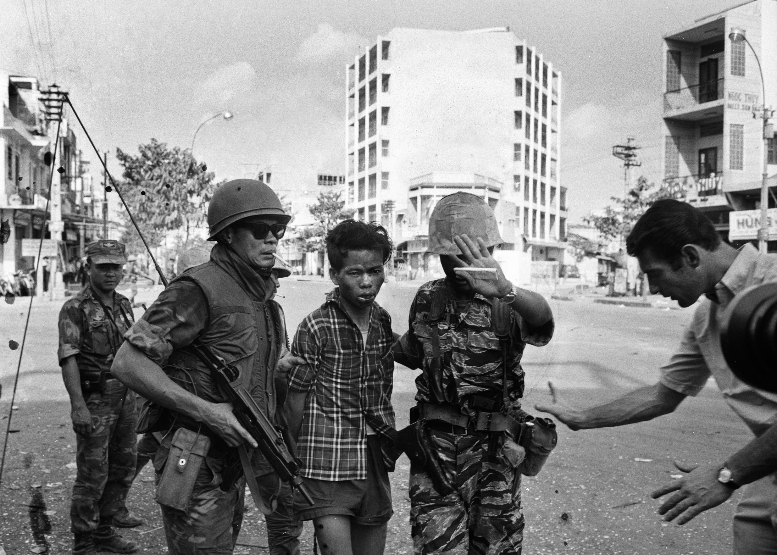 Nguyen Van Lem; Bay Lop South Vietnamese forces escort suspected Viet Cong officer Nguyen Van Lem (also known as Bay Lop) on a Saigon street Feb. 1, 1968, early in the Tet Offensive. Moments later, Lem was executed by Gen. Nguyen Ngoc Loan, chief of the national police. (AP Photo/Eddie Adams)